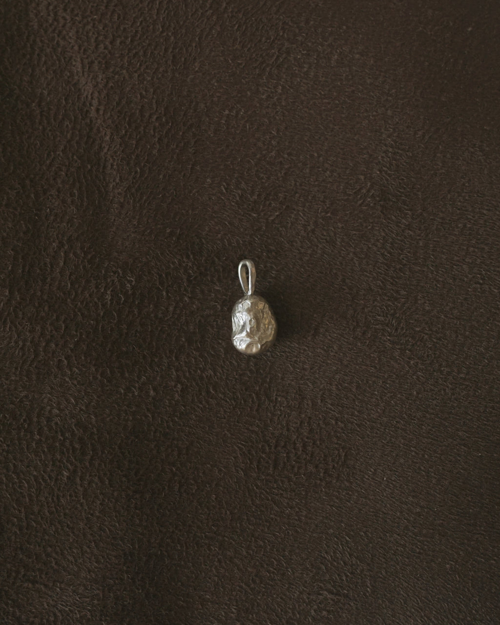 generous blue corn pendant