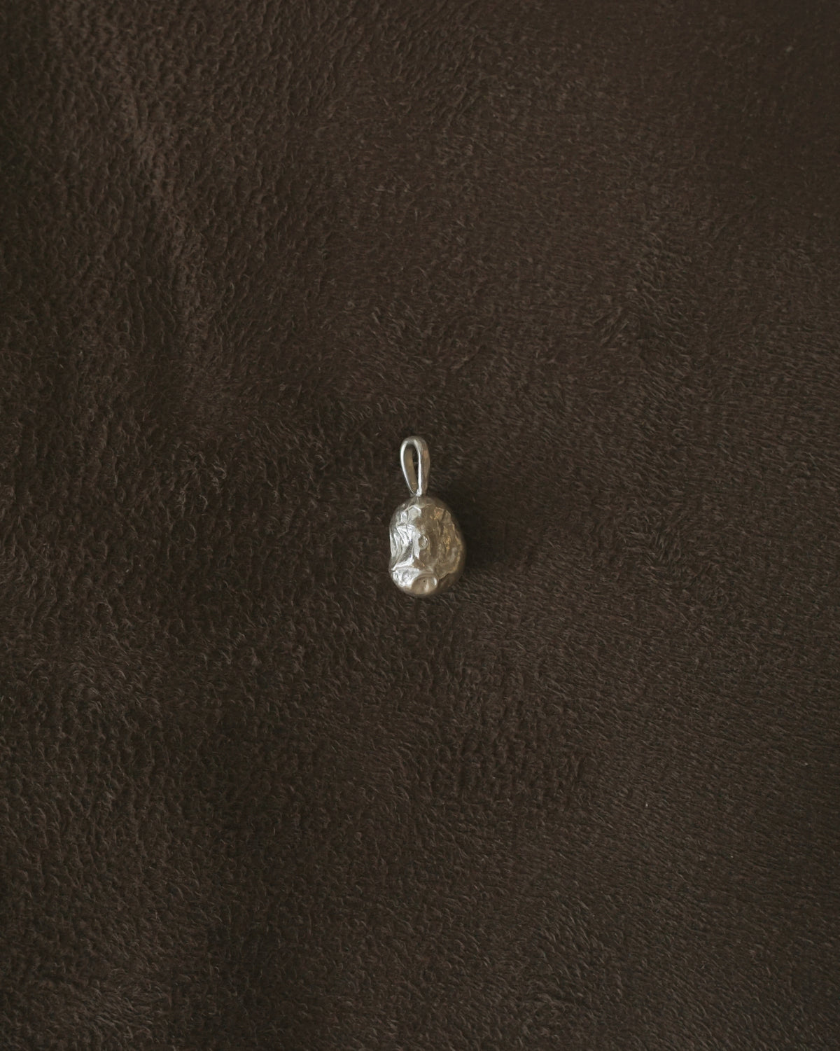 generous blue corn pendant