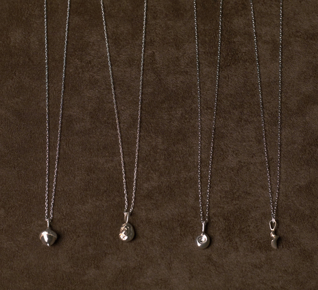wise snail pendant